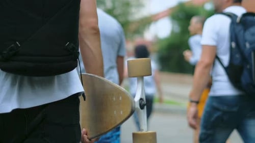 People Walking Down an Urban Street