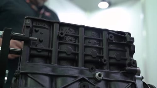 Close Up of Black Engine Block with Hardware