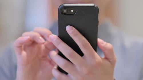 Hands Close Up of Woman using Smartphone