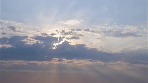Gorgeous Cloudy Sunset Sky with Golden Rays