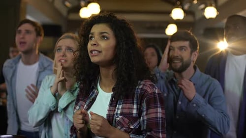 Young Spectators Rooting for Favorite Team Goal, Multi-Racial Fans at Stadium
