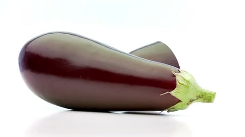 Fresh Eggplant Still Life Rotating on White Background