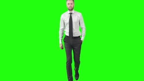 Man Walking Toward Camera on Green Screen