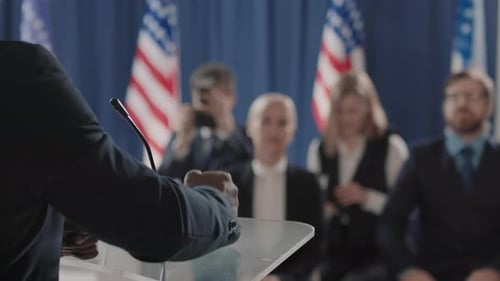 Speaker Gestures at a Corporate Press Conference