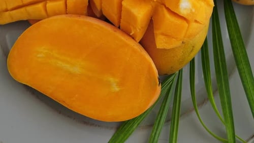 Yellow Ripe Cut Mango on Plate