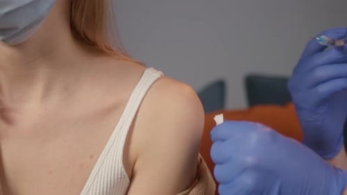 Female Doctor Vaccination Process Making Covid 19 Coronavirus Vaccine at Home or Hospital Safe