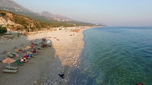 People on shore of beach in Albania