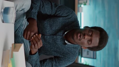 Portrait of Adult Smiling and Clasping Hands