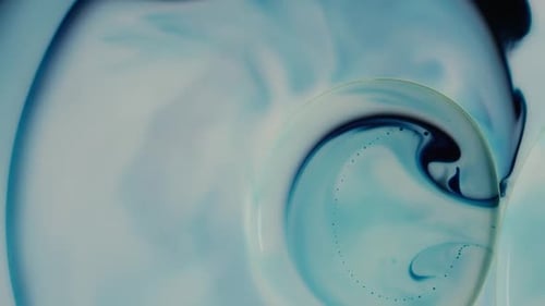 Macro Abstract Liquids Swirling in Blue