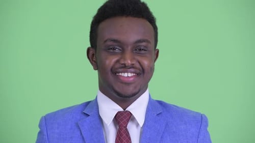 Face of Happy Young African Businessman in Suit Smiling