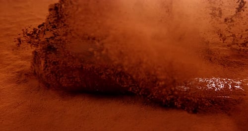 Powder Surface Being Disrupted, Revealing White Trace