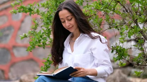 Reading a Book in the Park