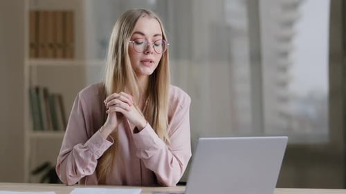 Young Adult Woman on Video Conference Call