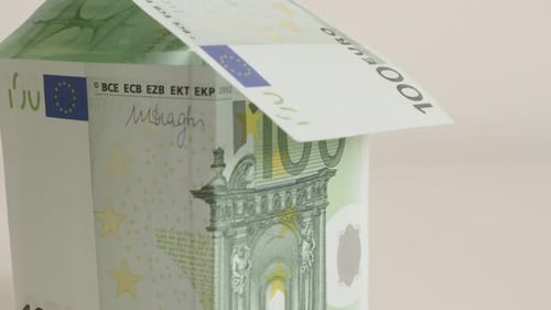 Real estate concept made of 100 Euro paper currency 4K 2160p 30fps UltraHD tilting footage - Hund