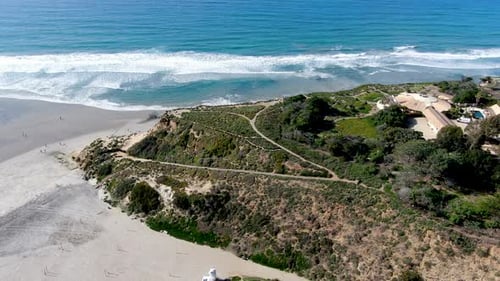 Aerial View of Del Mar North Beach, California Coastal Cliffs and House with Blue Pacific Ocean
