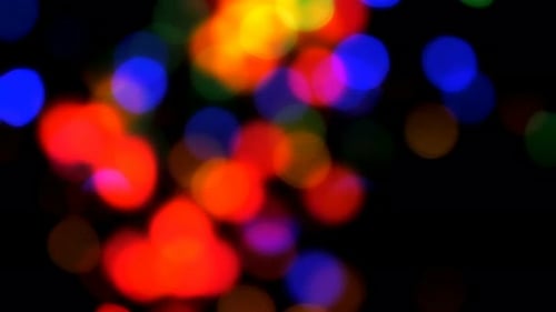 Defocused Abstract Multi-Colored Lights on Black Background