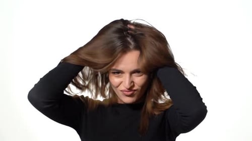 Beautiful Woman Posing and Playing with Her Hair