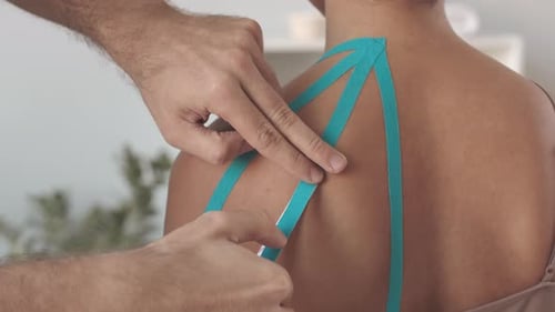 Application of Therapeutic Tape for Muscle Support