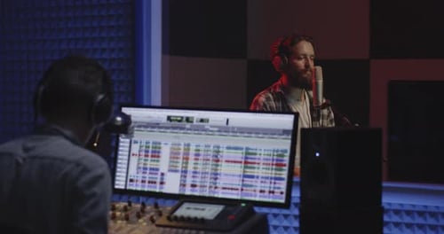 Actor Doing Voice Over in Sound Studio