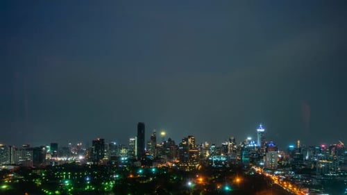Time Lapse Night Cityscape and Highrise Buildings in Metropolis City Center