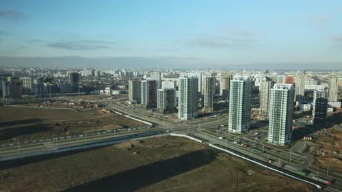 Aerial View of Modern Residential Towers and City
