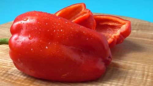 Fresh Red Bell Pepper on Cutting Board