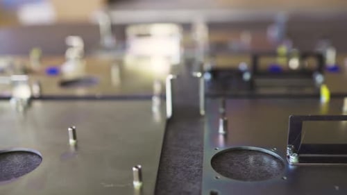 Slider Shot of a Blank Metal Components in Workshop Laboratory