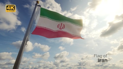 Flag of Iran Waving Against Bright Blue Sky
