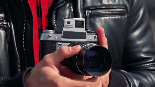 Vintage Camera Used by Trendy Photographer Close Up