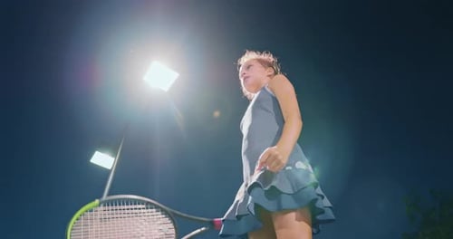 Girl Celebrates Tennis Victory on Urban Court