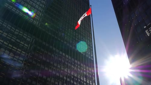 Canadian Flag Waving on Modern Building Exterior