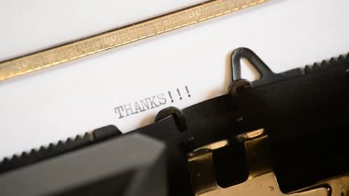 Typing 'Thanks' on a Vintage Typewriter