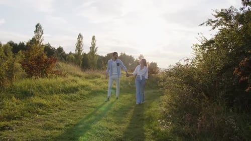 Romantic Couple Walking in Park