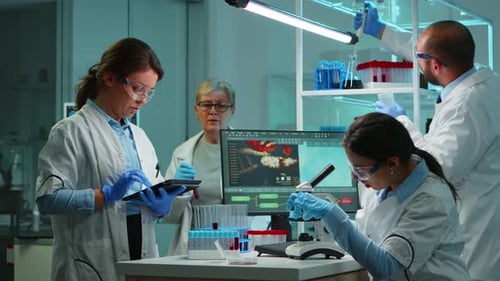 Scientists Collaborating on Medical Research in Laboratory