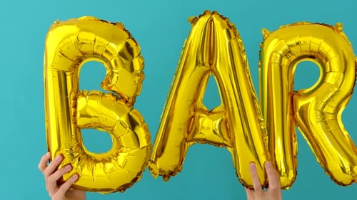Golden BAR Word Made of Inflatable Balloons