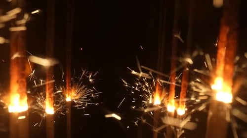 Sparklers Against Black Studio Background