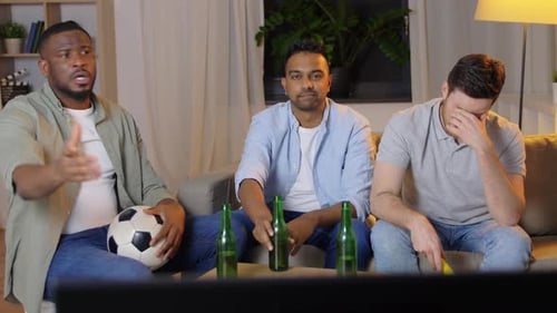 Friends with Ball and Vuvuzela Watching Soccer