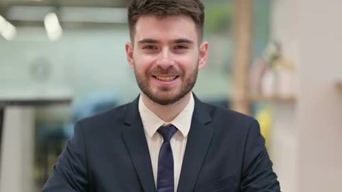 Smiling Young Professional in Business Suit Close Up