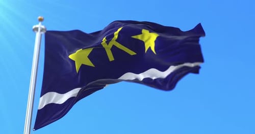 Realistic Blue Flag with Yellow Stars and 'K' Letter Waving