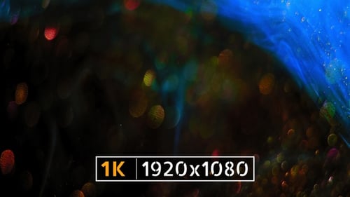 Abstract Glittering Bokeh Orbs on Blue Background