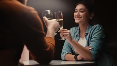 Couple Toasting Champagne at Intimate Celebration