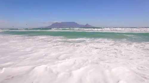 Aerial travel drone view of Table Mountain, Table Bay from Bloubergstrand, Cape Town, South Africa.