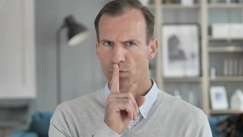Silent Silence Gesture By Middle Aged Man