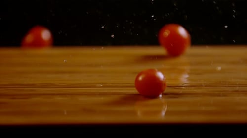 Cherry tomatoes bouncing and rolling, Ultra Slow Motion