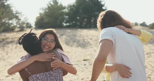 Friends Greeting Each Other by Tropical Lake