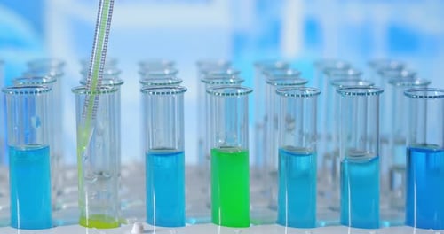 Scientist Testing in Laboratory for Analysis or Researching. Laboratory Tube with Blood and Virus
