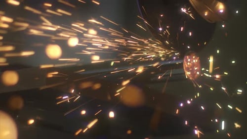 Cutting Silver Pipe Creating Bright Sparks