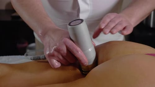 Massage Therapist Giving Leg Massage Treatment