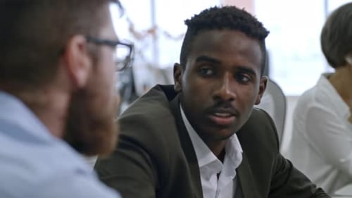Talking at Business Meeting