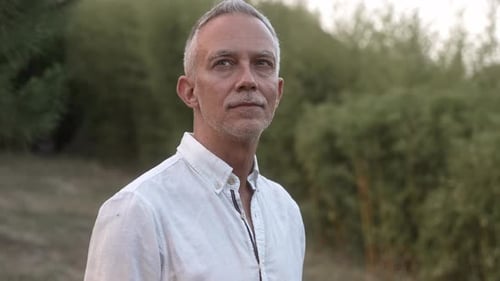 Portrait of Mature Man Standing in Nature Forest Breathing Fresh Air Contemplating Nature at Dusk